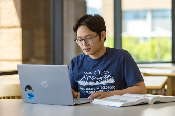 Student studying in library